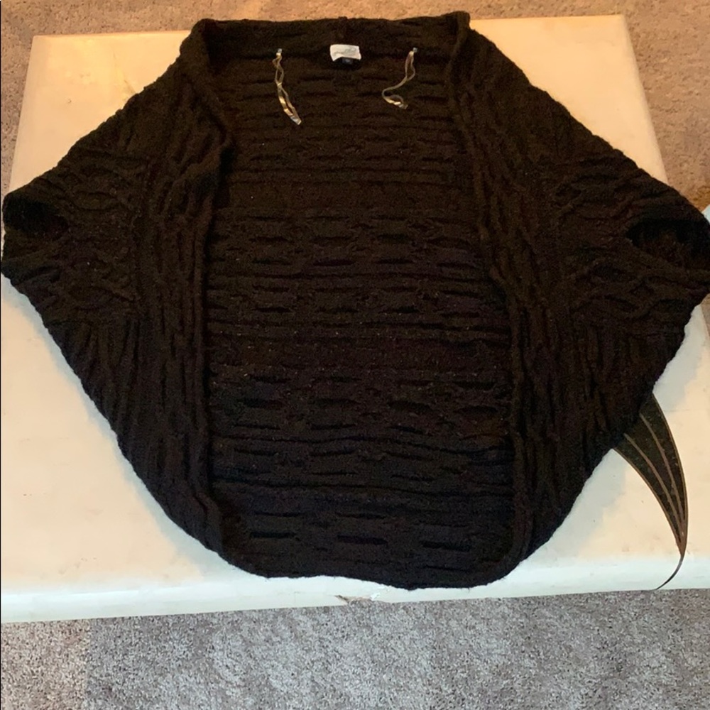 Large knit open armed sweater